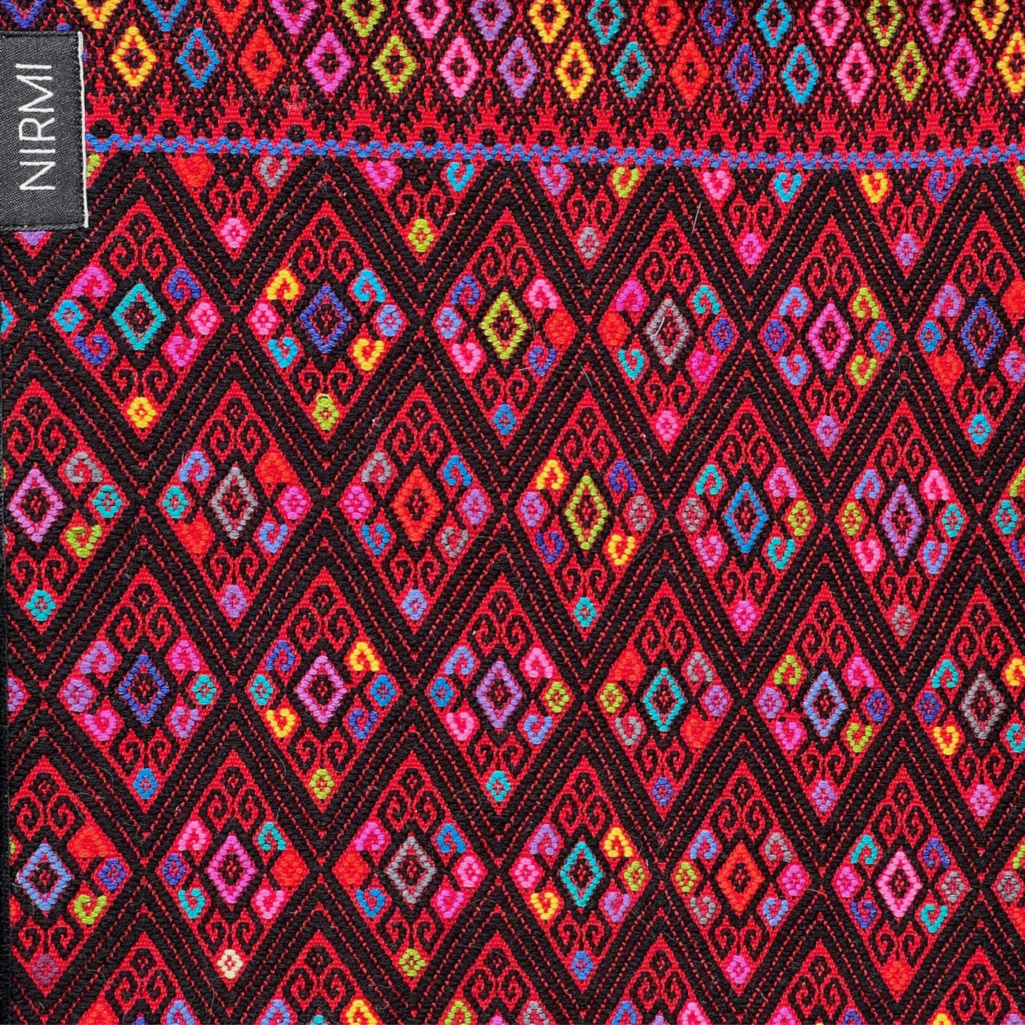 Portabebé NIRMI Pure con Impact Patch Ch'ixal nichim (México)